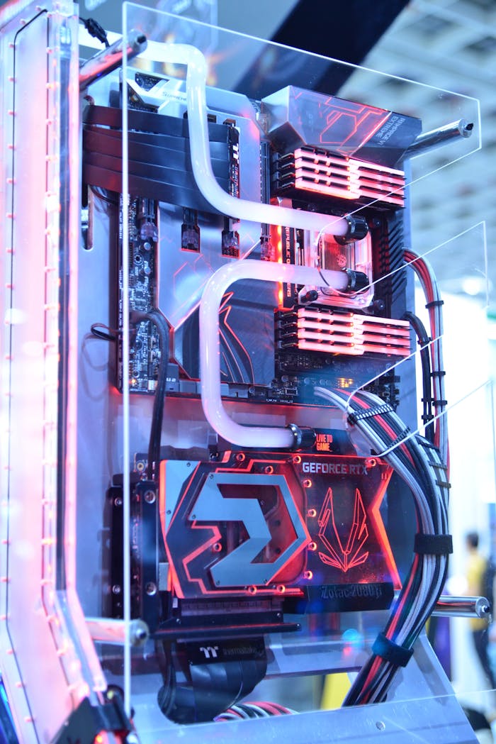 Home Close-up view of a custom gaming PC with water cooling and LED lights, highlighting advanced technology.